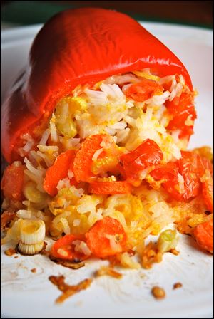 Depending on what ingredients you have on hand, you can freely substitute vegetables, grains, and cheese in this recipe for Confetti-Baked Peppers.