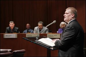 Matt Sapara, the city’s development director, speaks to the newly seated city council on Thursday at One Government Center. He apologized to members for the need for secrecy over the deal.