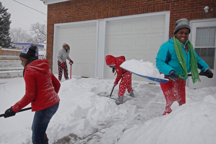 CTY-Snowstorm02p-smith-family-shoveling