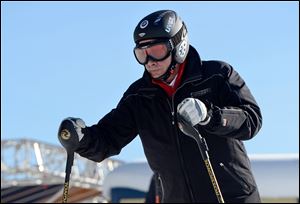 Russian President Vladimir Putin skies at the mountain resort of Krasnaya Polyana near the Black Sea resort of Sochi, southern Russia.