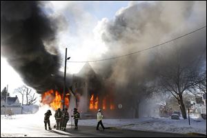 St. Mark Baptist Church on North Detroit Avenue at Fernwood Avenue is destroyed by fire Friday.