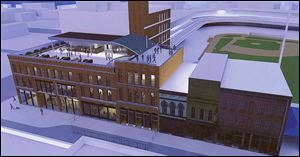 An architect’s rendering supplied by the Toledo Mud Hens organization shows the proposed Hensville development at Washington and South St. Clair streets. 