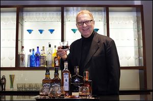 Robert Zollweg, creative director, holds a glass from the new collection at the Libbey showroom. ‘Restaurateurs don’t want to serve really good bourbon in an ordinary bar glass,’ he says.