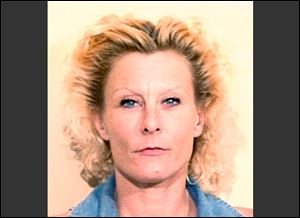 This June, 1997 file booking photo provided by the Tom Green County Jail in San Angelo, Texas, shows Colleen R. LaRose, also known as 'Jihad Jane.'