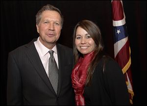 Elizabeth Ranade-Janis, with Ohio Gov. John Kasich after a December Chamber of Commerce meeting, is Ohio’s first coordinator against human trafficking.