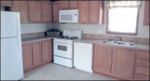 Home chefs will love cooking in this large, eat-in kitchen. Quality Whirlpool appliances are included. 
