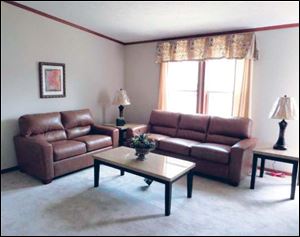 The inviting living room is an ideal place to entertain visitors. 