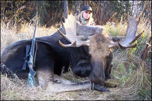 Katelyn Spalding shot this bull moose in Alberta late in 2013 at about 250 yards just after sunrise. The moose weighed 1,100 pounds and his rack measures 40 inches with 16 points.