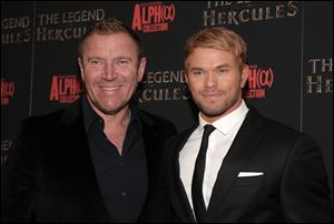 Director Renny Harlin, left, and actor Kellan Lutz, right, attend a screening of 