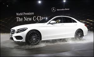 Mercedes Benz unveils the new C-Class car at the North American International Auto Show in Detroit. Mercedes was the top-selling luxury brand once again last year, outselling second-place BMW by more than 25,000 vehicles.