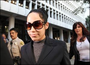 Nadya Suleman leaves Los Angeles County Superior Court after an arraignment in Los Angeles today.