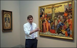 Adam Levine talks about a painting called ‘The Crucifixion’ by Jacobello del Fiore, at the Toledo Museum of Art.