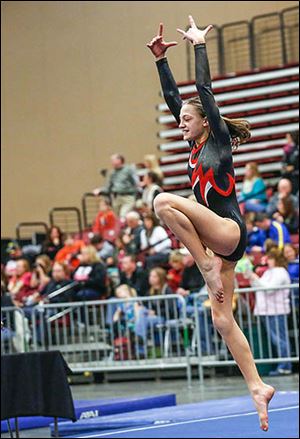 Toledo Turner’s Kate Ellis, 11, performs in the floor exercise at the Battle of Champions.