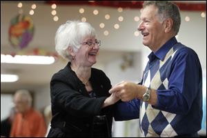 Judy Diener and her husband Ron Diener from Temperance, MI, dance together.