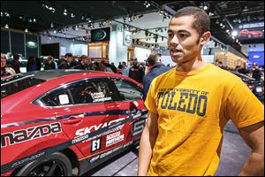 University of Toledo student Isaac Nichols says he appreciated the engineering involved in the vehicles. The Wauseon native, who is studying mechanical engineering, says he doesn’t want to work in the auto industry, but he loves it.