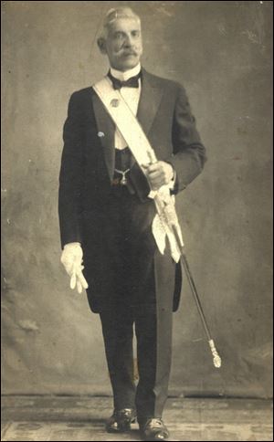 In 1881, Michael Habib Nassr became the first Arab to settle in Toledo. He originally came from the village of Bishara in Lebanon. This undated photo was taken around the turn of the century. He is wearing a Knights of Columbus sash and sword. In Toledo, he owned a wholesale fruit and produce store. 