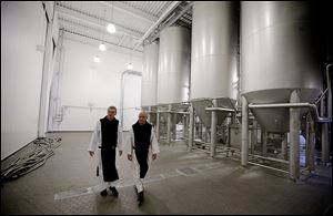 Father Damion, abbot at St. Joseph's Trappist Abbey, left, and Spencer Brewery director Father Isaac walk through their new, state-of-the-art facility in Spencer, Mass. The Spencer Brewery began brewing Spencer Trappist Ale recently becoming only the ninth certified brewery of Trappist beers in the world and the only one outside of Europe.