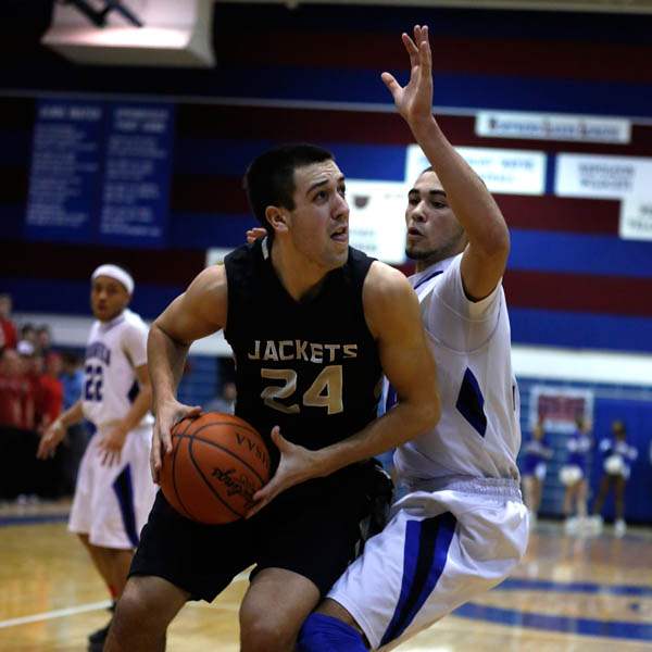 Perrysburg-s-Nick-Moschetti-is-guarded-by-Springfield-s-Manny-Durden