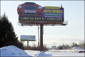 Billboard on the northbound side of I-280 near the Front Street.