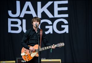 Jake Bugg performs live on the Pyramid Stage at day 2 of the 2013 Glastonbury Festival in Glastonbury, England.