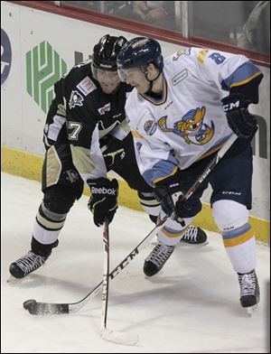 Bobby Shea, right, played in the first three games of the season for the Walleye and had one assist. 