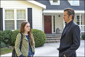 Kaitlyn Dever, left, as Loretta, Timothy Olyphant as Deputy U.S. Marshal Raylan Givens in the season 5 premier of ‘Justified.’
