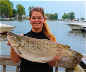 Keely Schuster of Toledo caught this 17-pound, 8-ounce brown trout in Lake Ontario while fishing in a tournament with her father. The trophy brown ended up being the second-largest one landed during the two-week event.