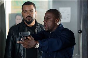 Ice Cube, left, and Kevin Hart in a scene from 'Ride Along.'