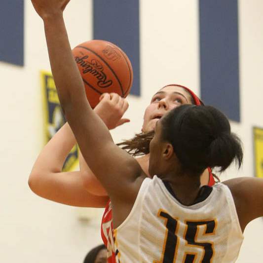 Central-Catholic-s-junior-Mikayla-Simon-50-goes-in-for-a-lay