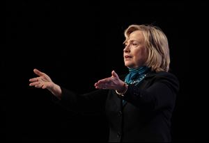 Former Secretary of State Hillary Rodham Clinton speaks to the National Automobile Dealers Association meeting Monday in New Orleans.