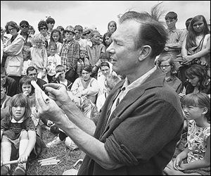 Pete Seeger conducted an instrument making session at the Newport Folk Festival, in Newport, R.I., in 1966.  Seeger taught generations of Americans how to effect change through song.