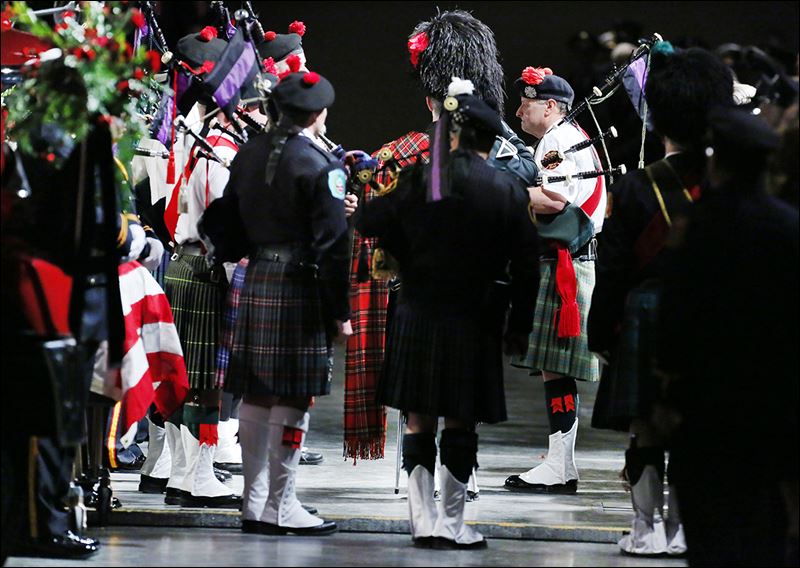 Bagpipe band performs