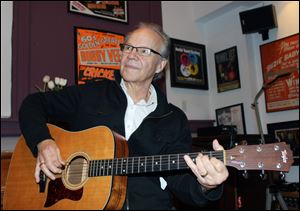  Bobby Vee plays the guitar at his family's Rockhouse Productions in St. Joseph, Minn. Alzheimer's disease forced the 1960s pop idol to stop performing in 2011.