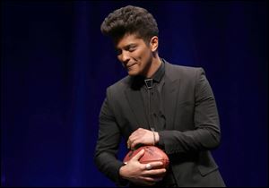 Bruno Mars will headline the halftime show at Super Bowl XLVIII on Sunday.