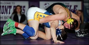 Oregon Clay's Matt Stencel defeats Whitmer's Jacob LaPoint by pin fall in the 195 pound championship match.