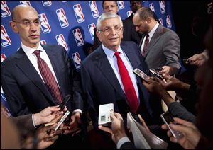 Adam Silver, left, replaces David Stern, right, who retired Saturday after exactly 30 years on the job. Silver will be the head of the league.