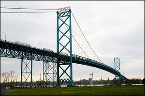 Officials hope to open the New International Trade Crossing over the Detroit River by 2020. If so, it would compete with the Ambassador Bridge, above. 