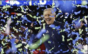 Seattle Seahawks coach Pete Carroll celebrates after winning Super Bowl XLVIII against the Denver Broncos on Sunday in East Rutherford, N.J. The Seahawks won 43-8.