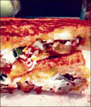 Loaded baked-potato grilled cheese sandwich.