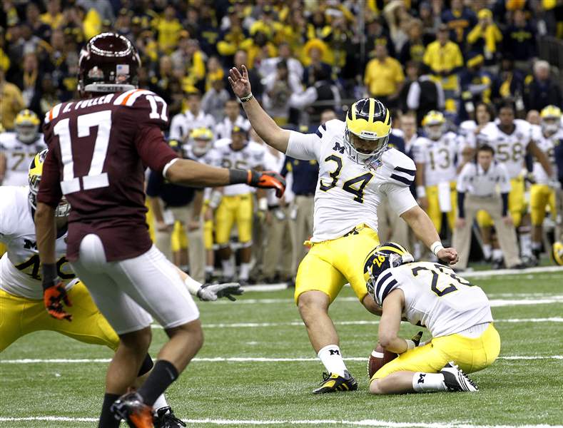 Michigan-s-Brendan-Gibbons-34-is-shown-here-kickin