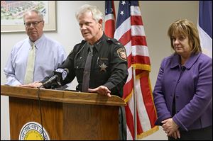Mayor D. Michael Collins, left, Lucas County Sheriff John Tharp, and Lucas County Commissioner Carol Contrada declare the Level 3 snow emergency Tuesday in a press conference at One Government Center.