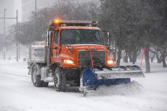 A-City-of-Toledo-snowplow-clears-snow-from-Jackson-Street