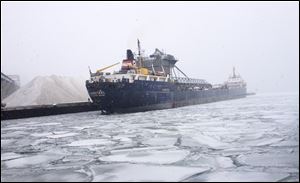 The Algosteel unloads it's cargo of road salt at the Port of Milwaukee today.