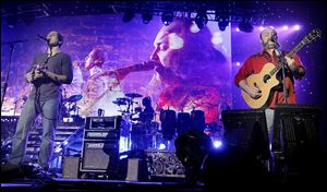 Jimmy De Martini, left, and John Driskell Hopkins perform with the The Zac Brown Band at the Huntington Center.