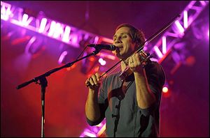 Jimmy De Martini performs with The Zac Brown Band at the Huntington Center in Toledo.