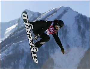 New Zealand's Rebecca Torr takes a jump during the women's snowboard slopestyle qualifying at the Rosa Khutor Extreme Park ahead of the 2014 Winter Olympics today in Krasnaya Polyana, Russia.