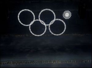 One of the Olympic rings fails to open during the opening ceremony.