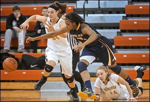 Notre Dame’s Tierra Floyd, center, goes after the ball along with Northview's Kendall Jessing, left, and Maddie Cole. Floyd finished with 27 points.