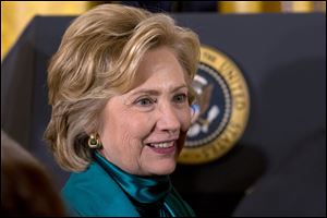 As Clinton considers another White House campaign, progressives are looking for signs that she could become their standard-bearer. On economic issues and diplomatic talks with Iran, Clinton has signaled she would be in step with a more progressive Democratic coalition forged during President Barack Obama's two campaigns. 