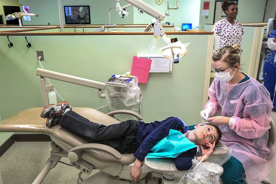 Free dental clinics give hundreds of area children a reason to smile